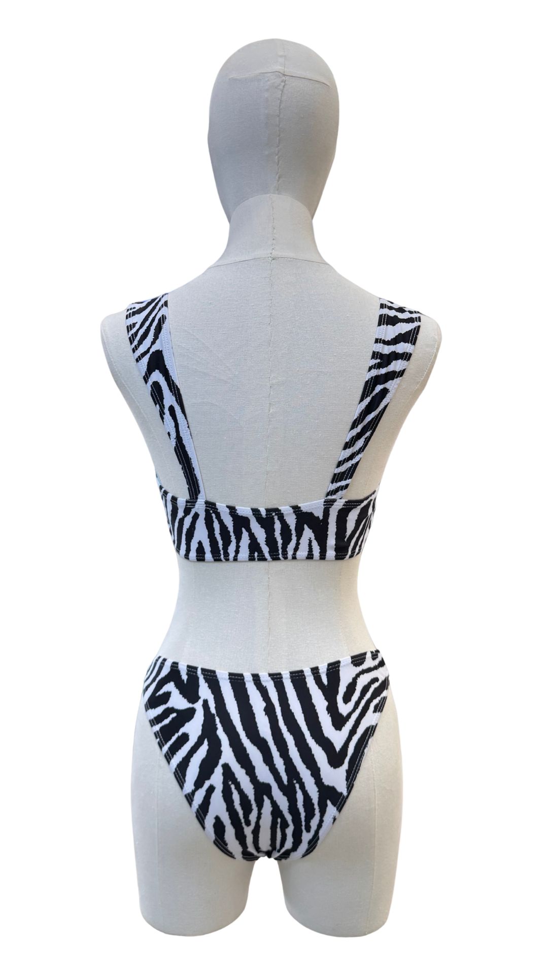 Set bikini de zebra con espiral dorado